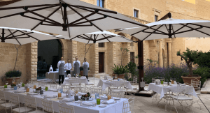 Breakfast in Castello di Ugento courtyard luxury hotel Salento